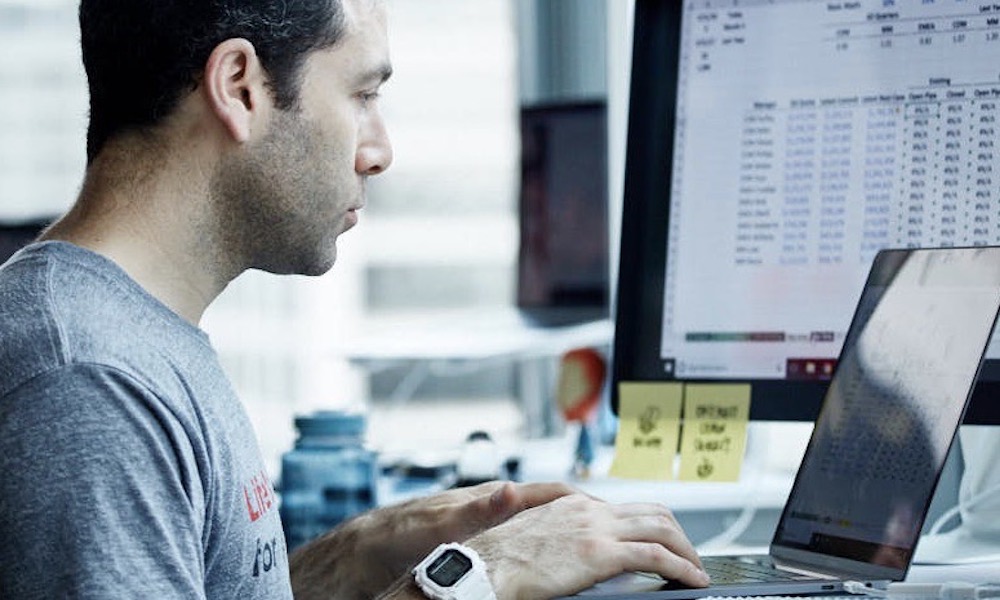 man working on laptop