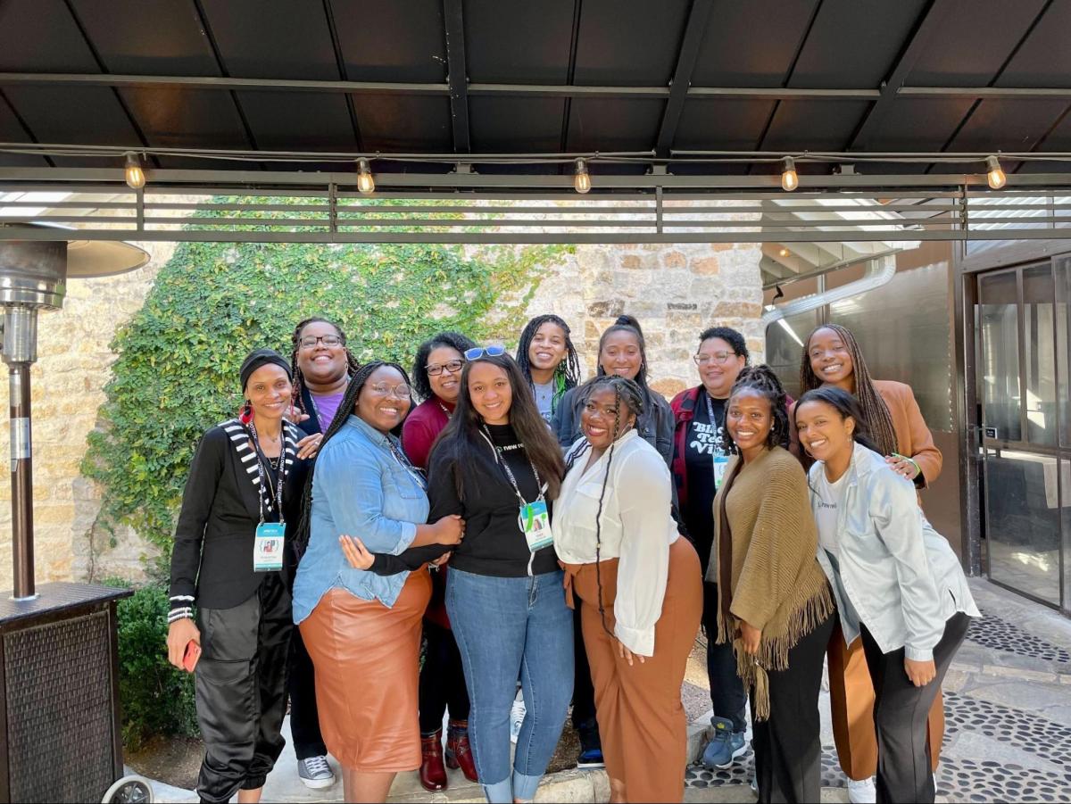 Group photo of women of color at AfroTech