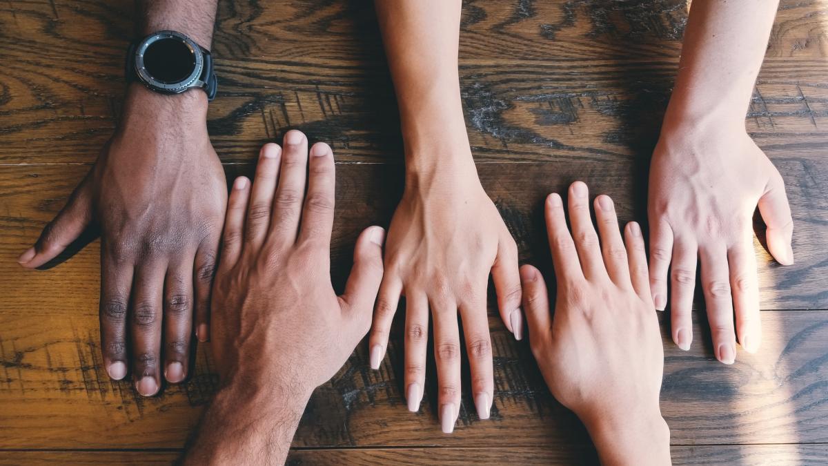 A variety of hands from people of different races