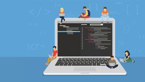 Laptop with code editor on screen