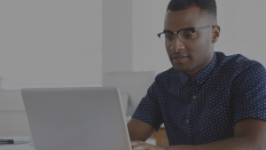 Person working on laptop in an office