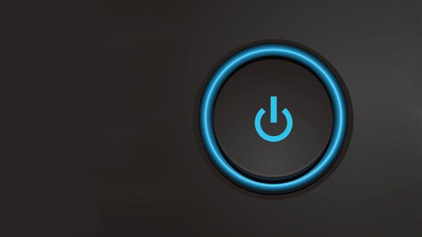 Device power button on black background