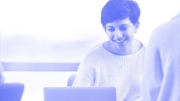 Person on laptop smiling