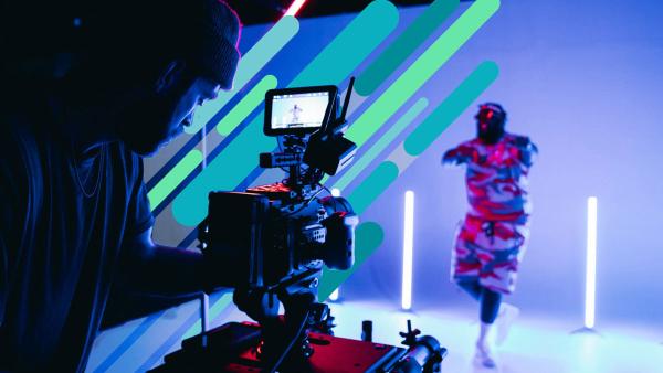 Person standing in front of a television camera