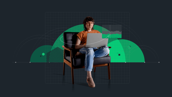 Persona sentada en una silla y trabajando en su laptop con un fondo de gráficos superpuestos