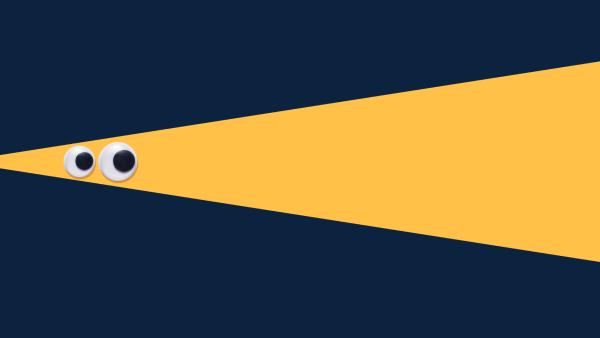 Image d'un triangle jaune, comme un rayon lumineux de lampe de poche, avec un fond noir et deux yeux