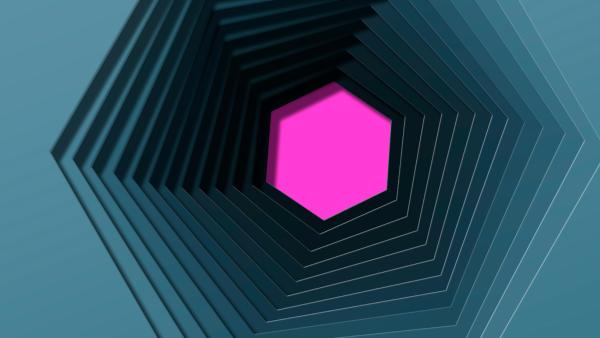 A pink hexagon inside of multiple blue hexagons
