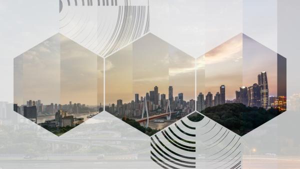 A cityscape photo viewed through 3 hexagon segments