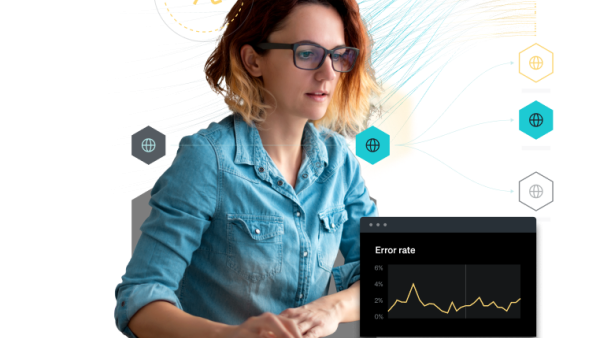 Persona trabajando frente a la pantalla de su equipo con gráficos de hexágonos