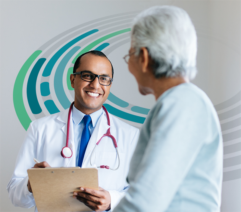 Depicted is a healthcare professional advising a patient.