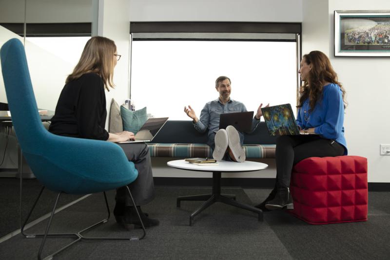 People sitting around a coffee table