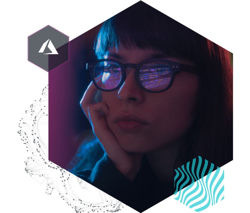 Stylized image of a woman's face with code reflected in her glasses.